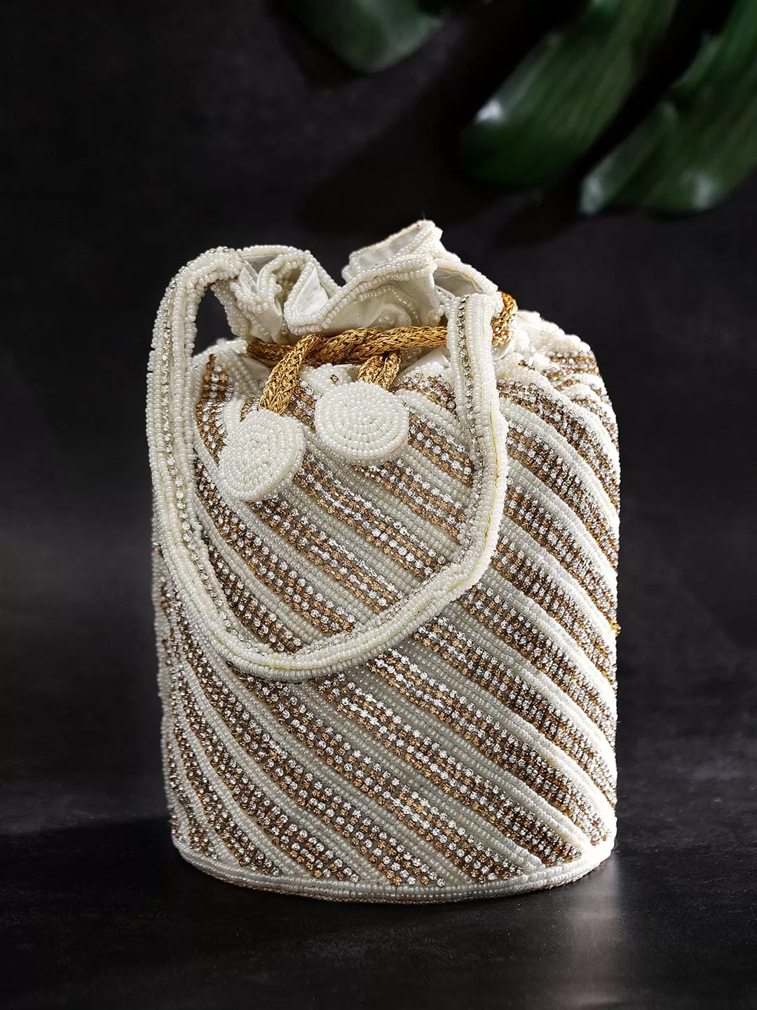 Rubans White Coloured Potli Bag With Golden Embroided Design.