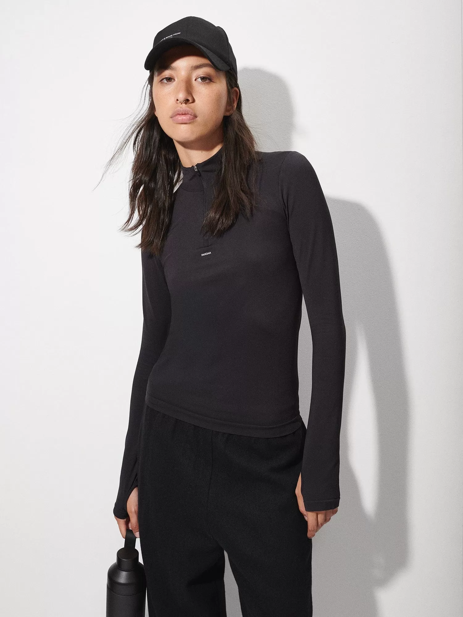 Women's Plant-Stretch Zipped Long Sleeve Top—black